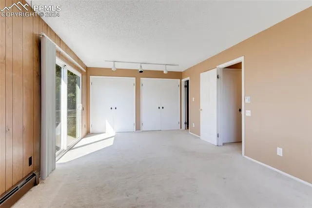a view of a sink and cabinets