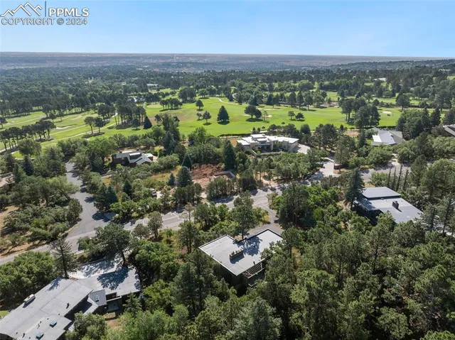 an aerial view of a city with lots of residential buildings