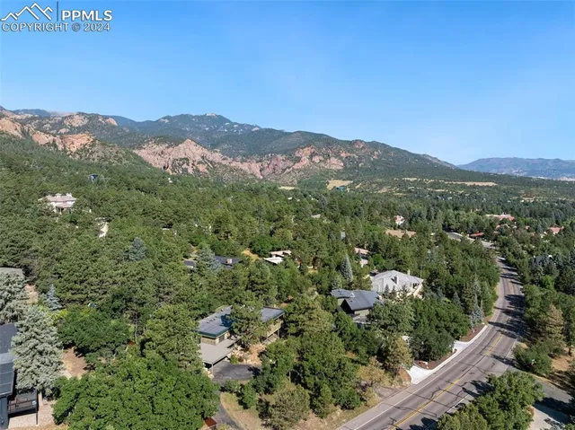 a view of a city with mountain