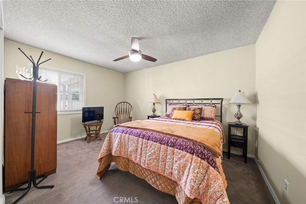 513 West Shadwell Street Carson, CA 90745 - Photo 13 of 23 a bedroom with a bed dresser and window