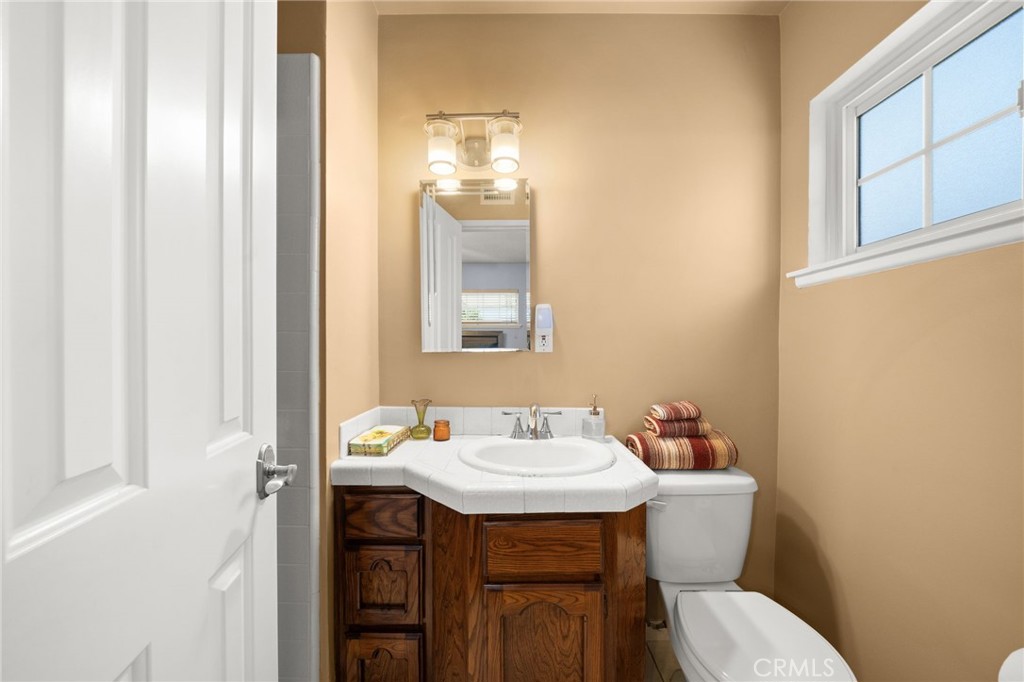 513 West Shadwell Street Carson, CA 90745 - Photo 18 of 23 a bathroom with a sink and a toilet