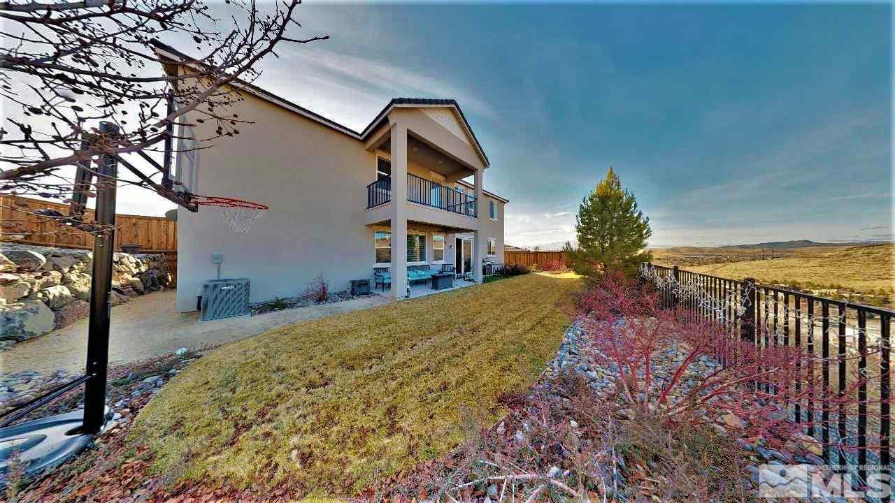 2248 Isabella Drive Sparks, NV 89434 - Photo 20 of 22 a front view of a house with a yard