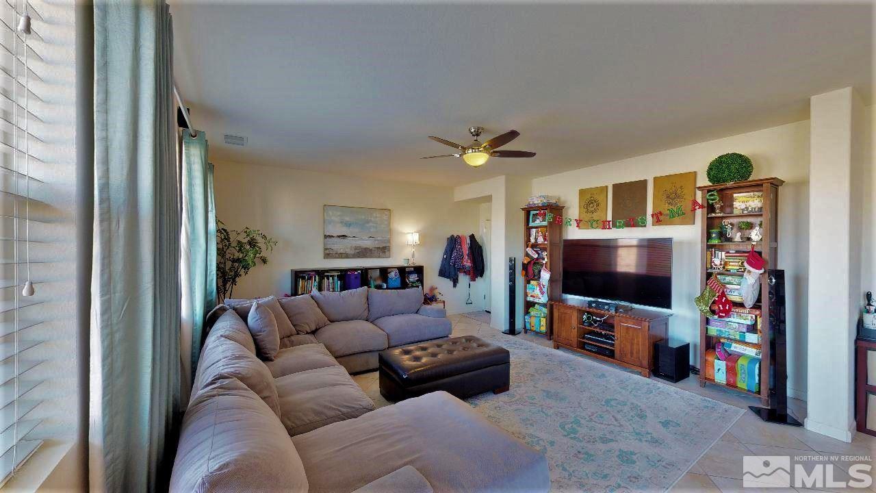 2248 Isabella Drive Sparks, NV 89434 - Photo 7 of 22 a living room with furniture and a flat screen tv