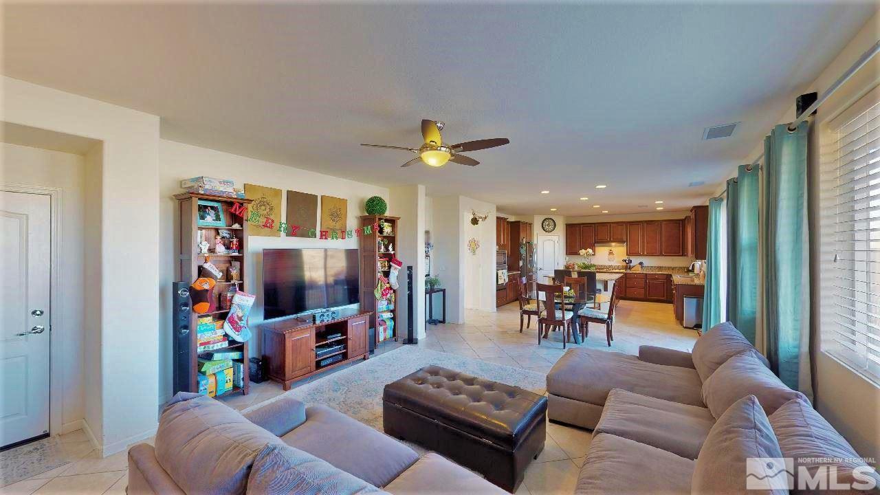 2248 Isabella Drive Sparks, NV 89434 - Photo 8 of 22 a living room with furniture and a flat screen tv