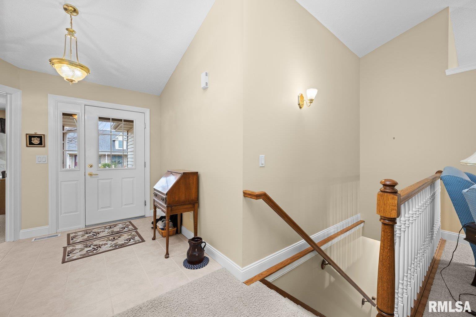 451 Celeste Circle Blue Grass, IA 52726 - Photo 22 of 35 a view of a room with gym equipment