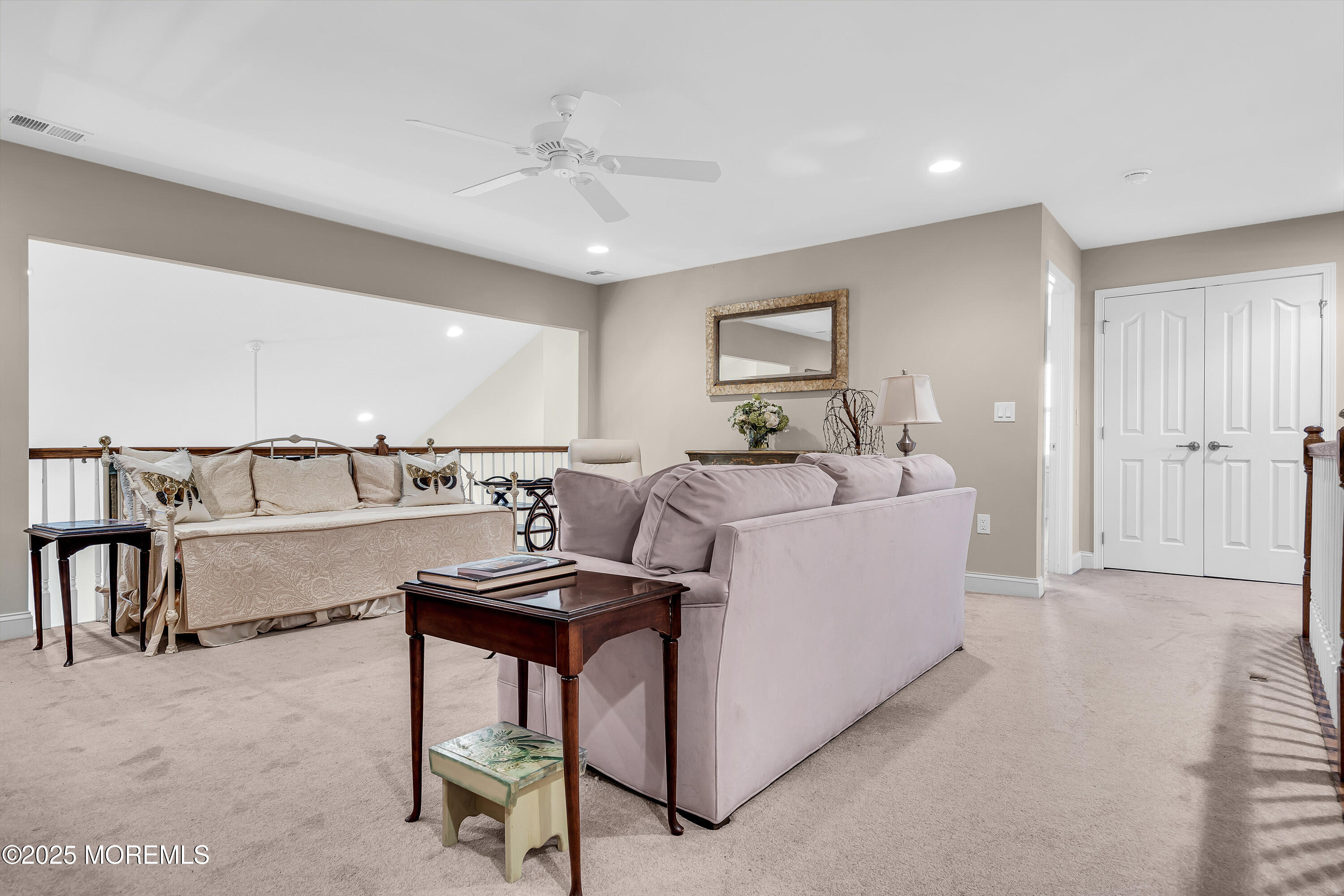 14 Harvey Cedar Way Waretown, NJ 08758 - Photo 39 of 59 a living room with a couch and furniture