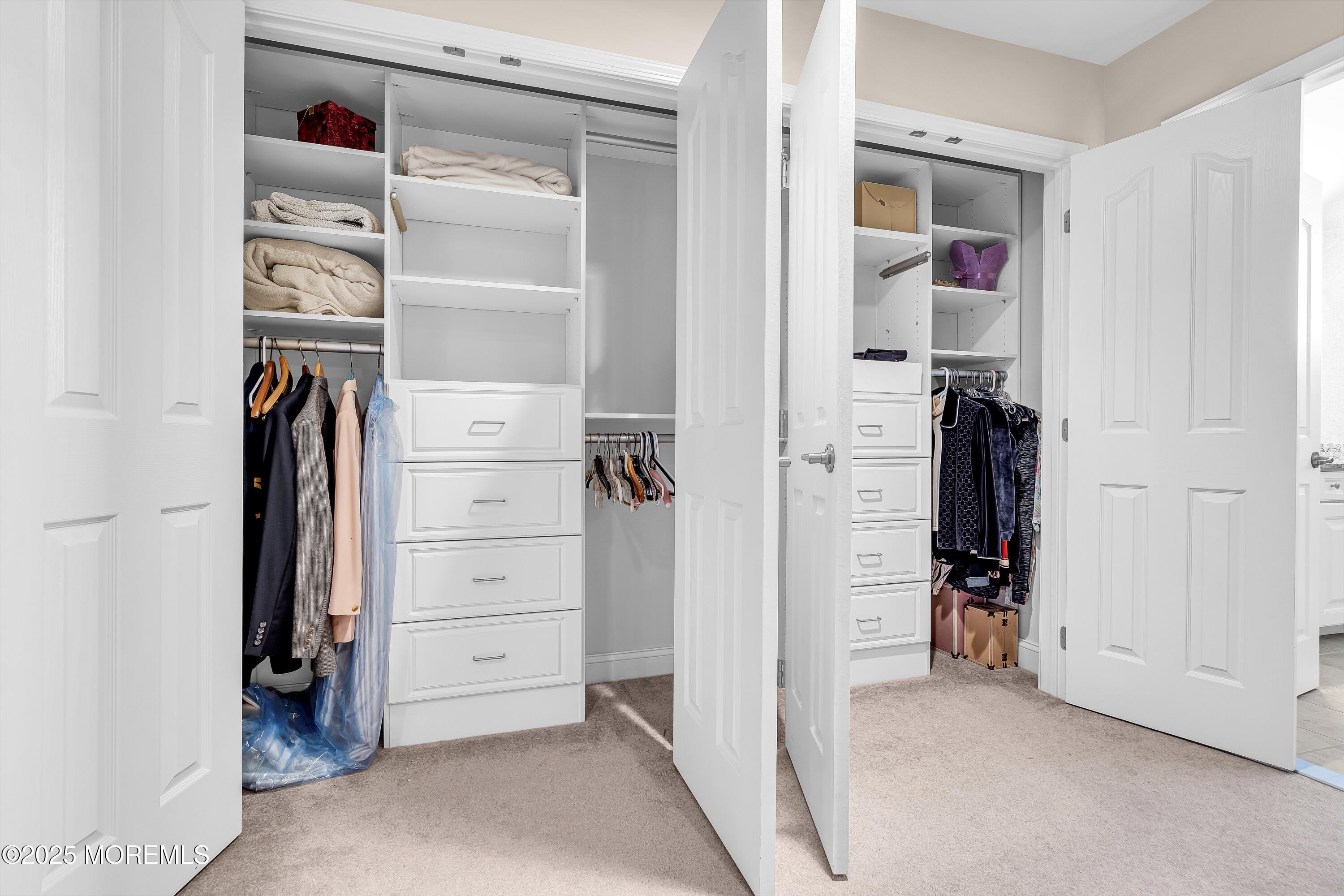 14 Harvey Cedar Way Waretown, NJ 08758 - Photo 45 of 59 a view of walk in closet with clothes and shoes