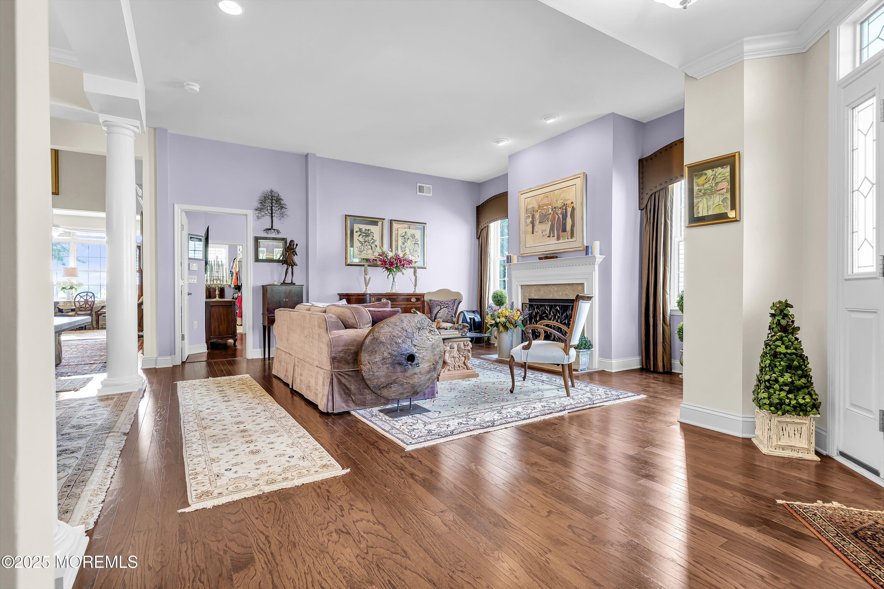 14 Harvey Cedar Way Waretown, NJ 08758 - Photo 10 of 59 a living room with furniture and a fireplace
