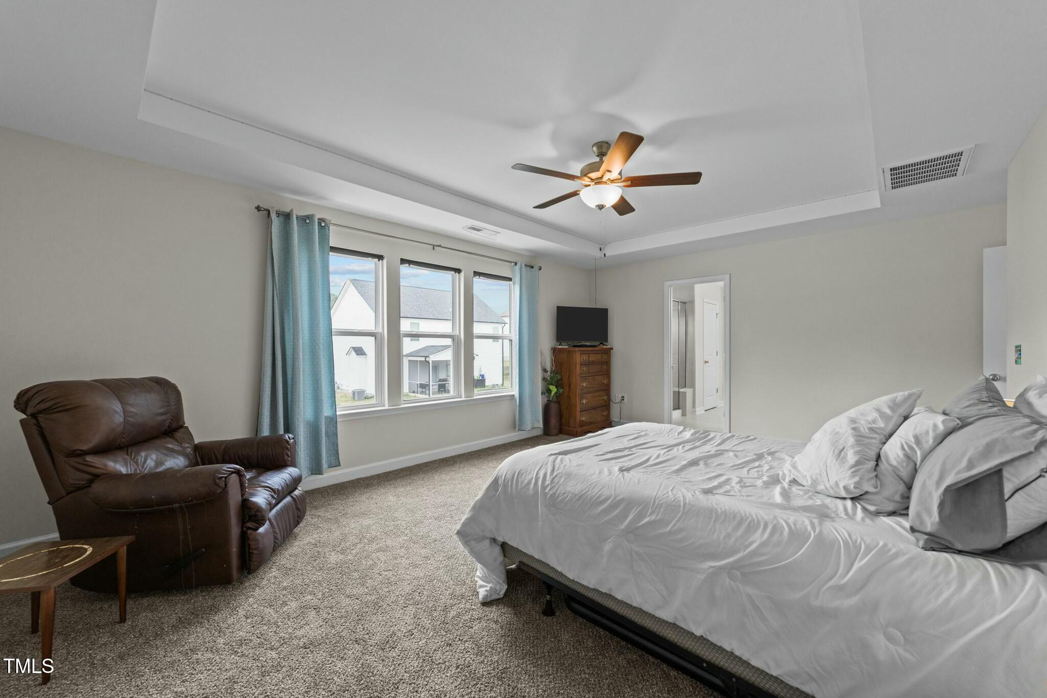 118 Lockhaven Drive Garner, NC 27529 - Photo 23 of 56 a bedroom with a bed furniture and a window