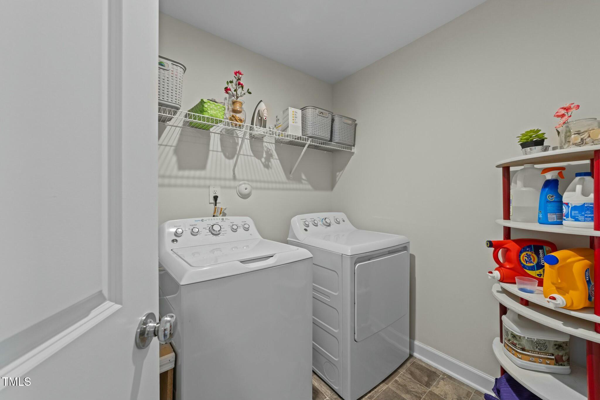 118 Lockhaven Drive Garner, NC 27529 - Photo 36 of 56 a utility room with dryer and washer