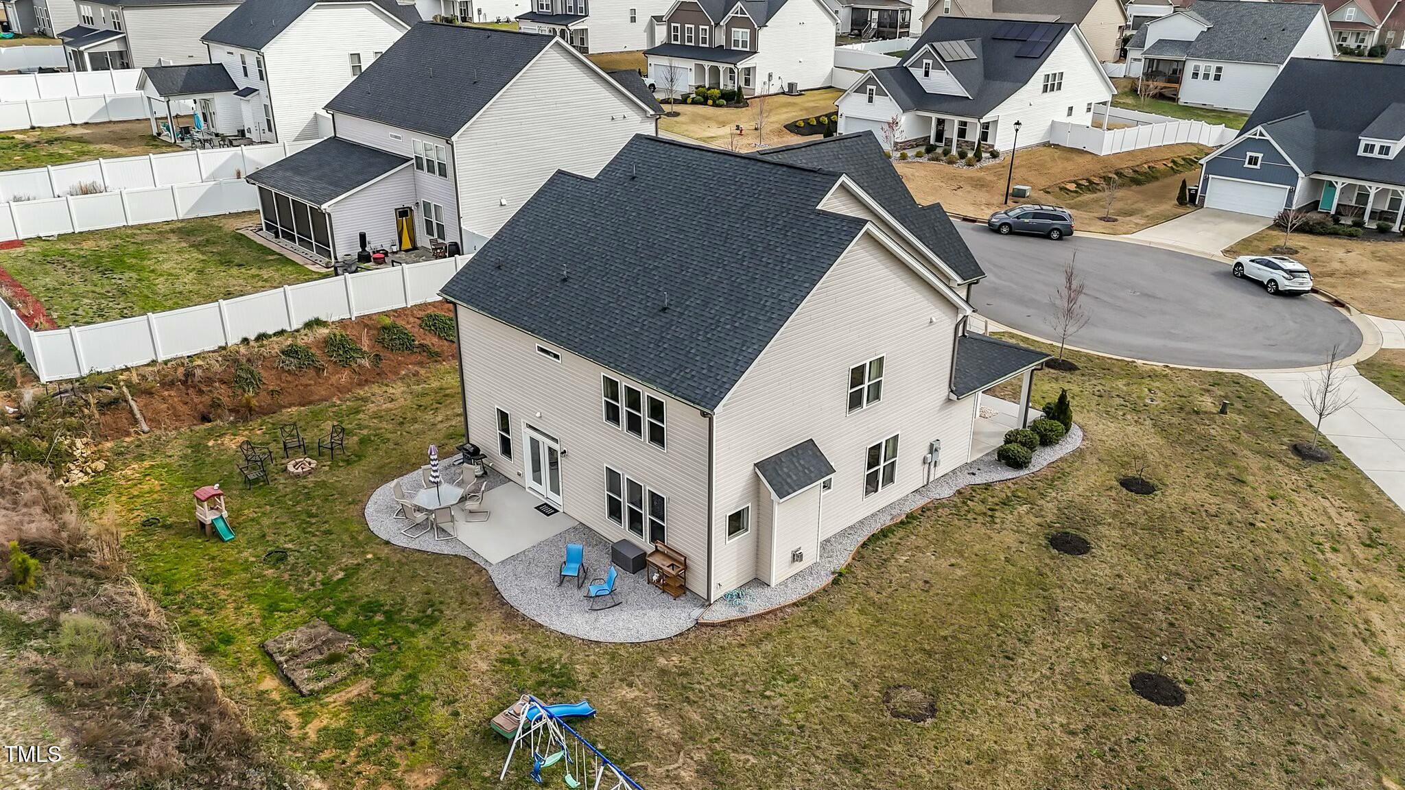 118 Lockhaven Drive Garner, NC 27529 - Photo 44 of 56 an aerial view of a house with backyard