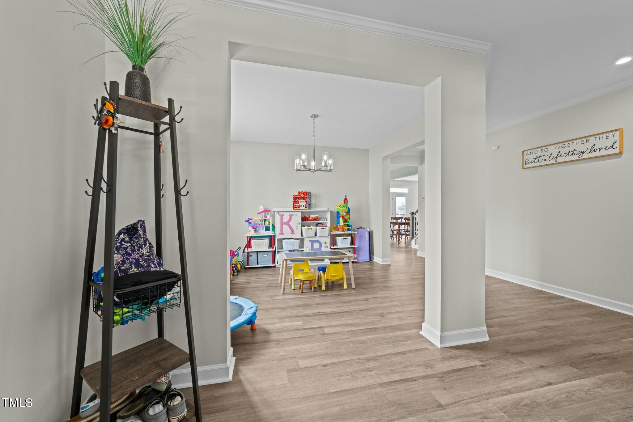 118 Lockhaven Drive Garner, NC 27529 - Photo 4 of 56 a living room with furniture and a wooden floor