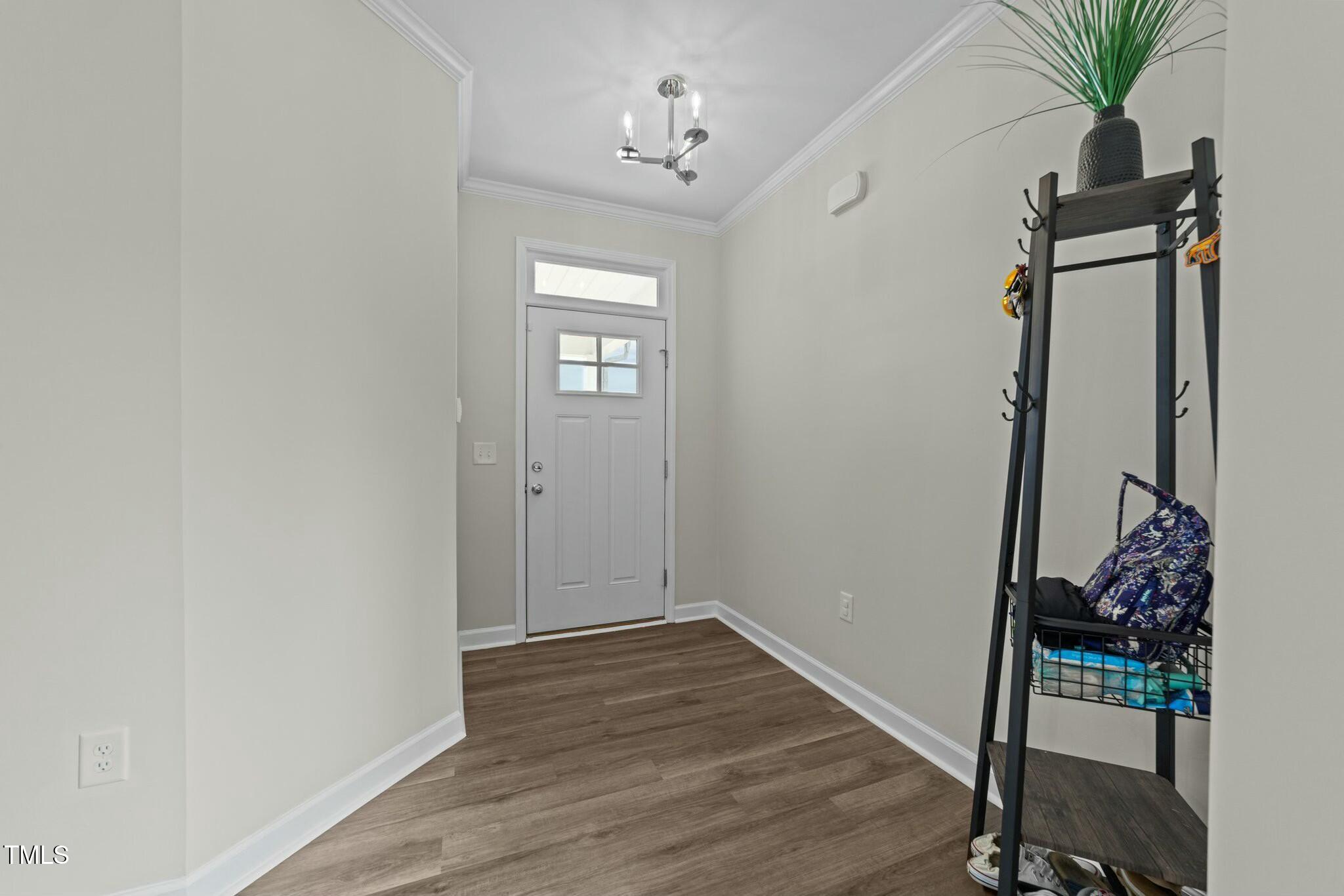 118 Lockhaven Drive Garner, NC 27529 - Photo 5 of 56 a view of entryway with wooden floor