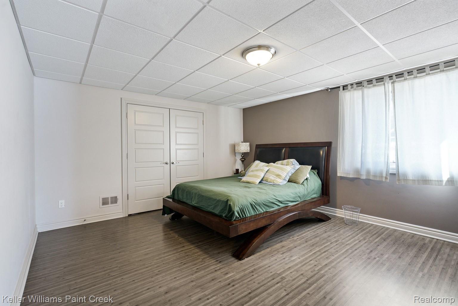 2926 Croftshire Court Rochester, MI 48306 - Photo 52 of 72 This finished walk out also has its own Bedroom!