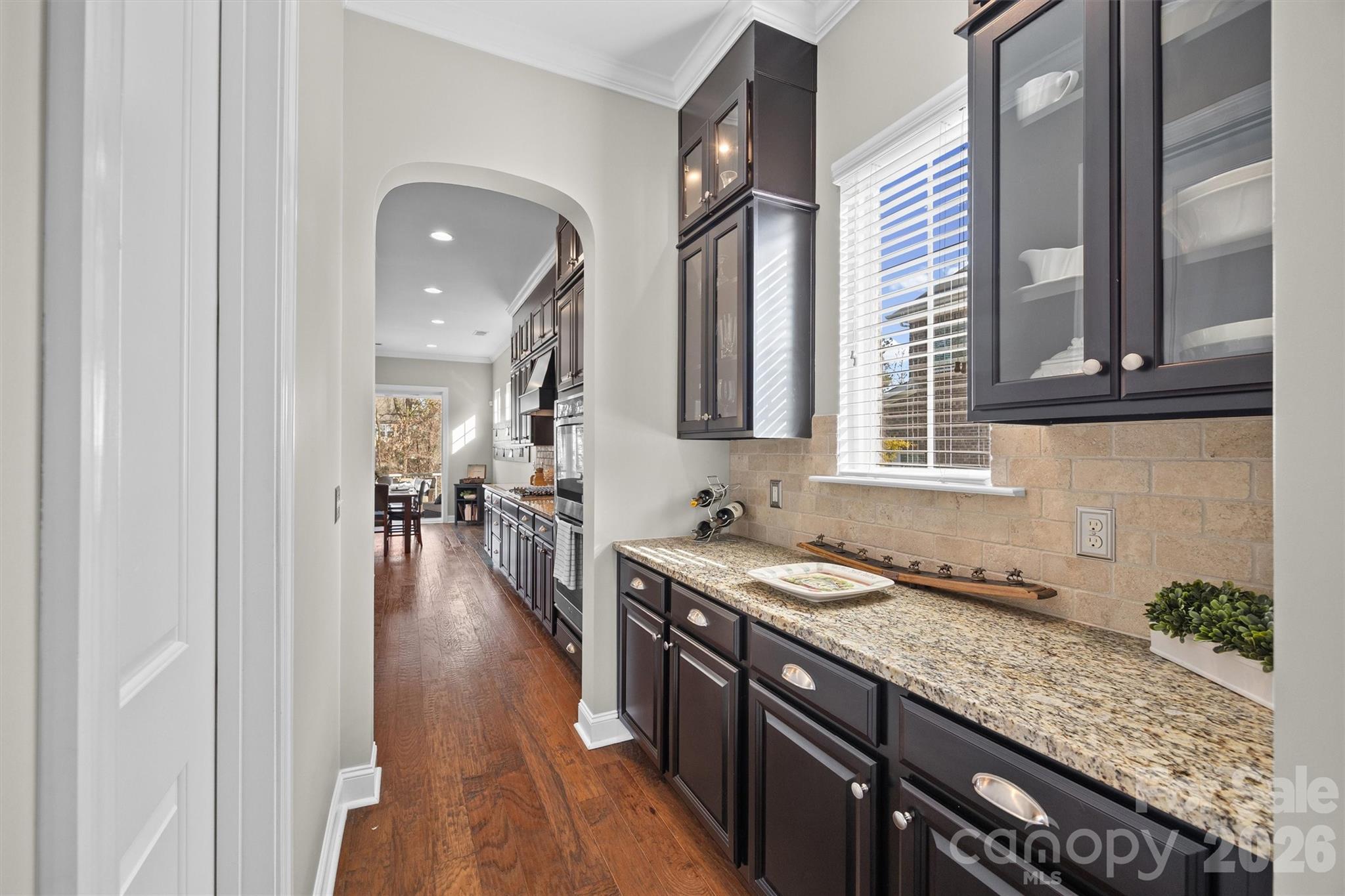 954 Castlewatch Drive Fort Mill, SC 29708 - Photo 13 of 45 a kitchen with granite countertop a sink and cabinets