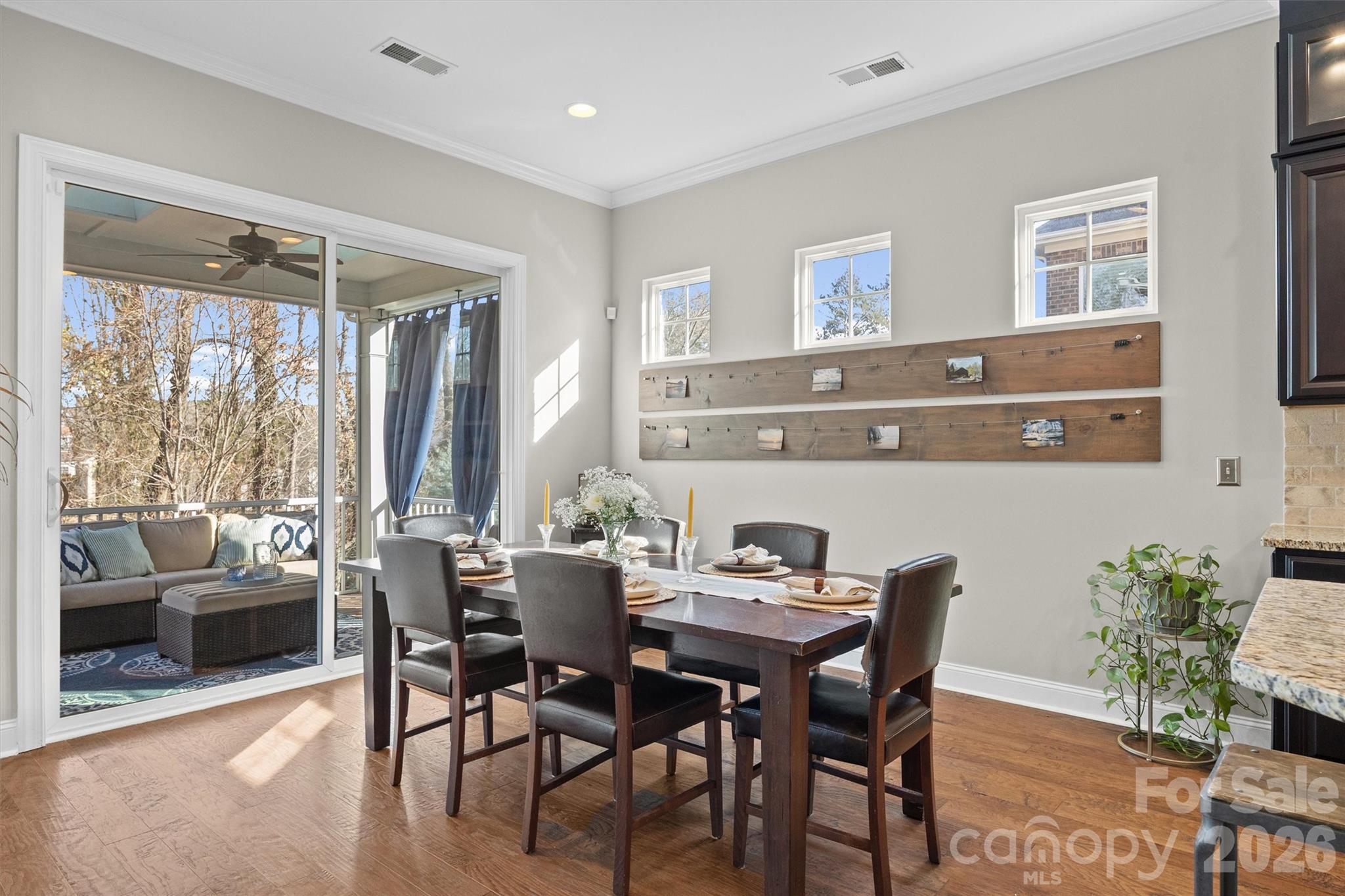 954 Castlewatch Drive Fort Mill, SC 29708 - Photo 14 of 45 a view of a dining room with furniture window and outside view
