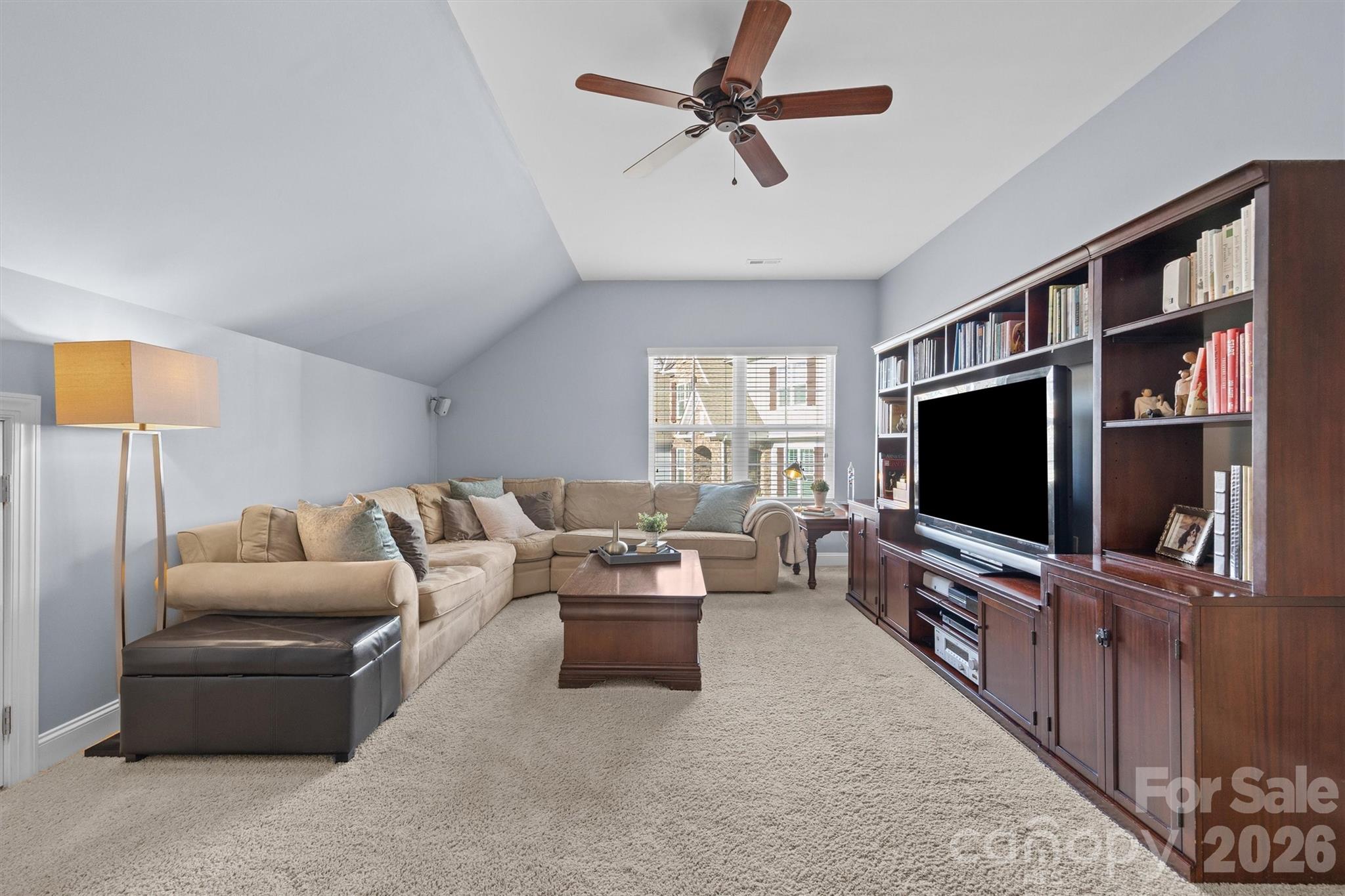 954 Castlewatch Drive Fort Mill, SC 29708 - Photo 19 of 45 a living room with furniture and a flat screen tv