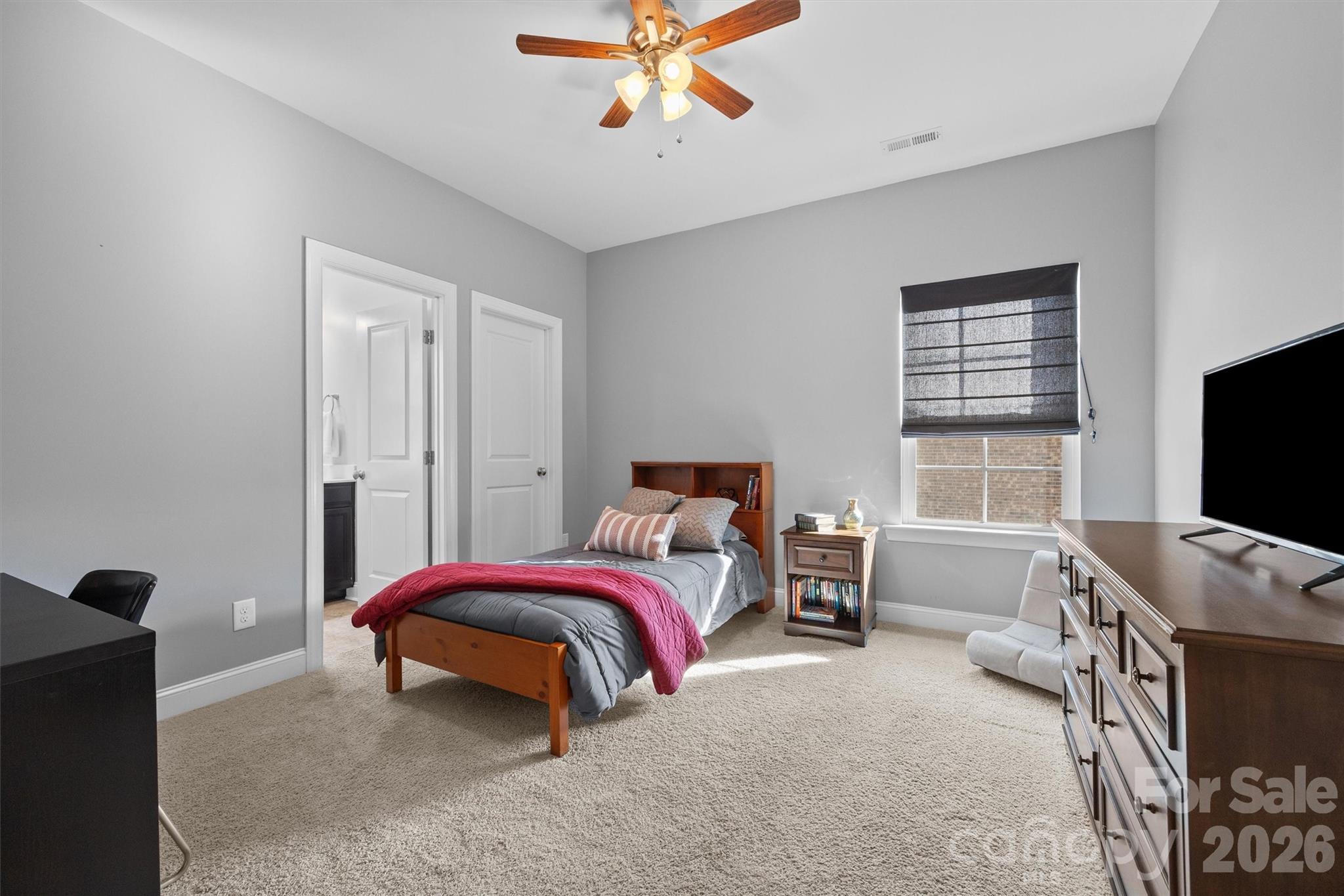954 Castlewatch Drive Fort Mill, SC 29708 - Photo 32 of 45 a bedroom with a bed and a flat screen tv
