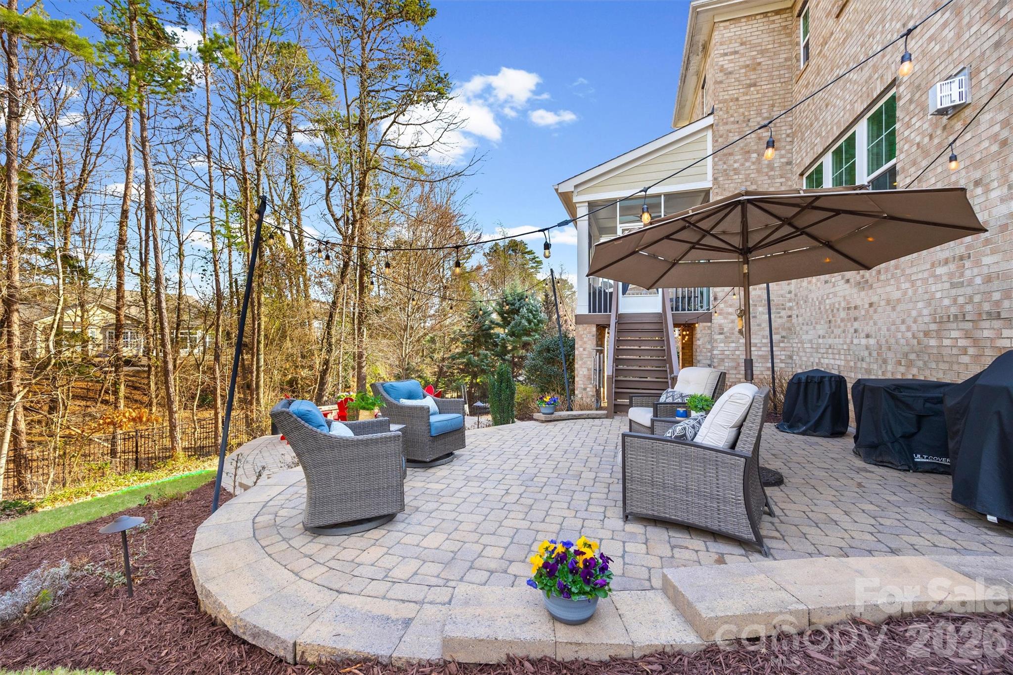 954 Castlewatch Drive Fort Mill, SC 29708 - Photo 38 of 45 a view of a patio with couches and potted plants