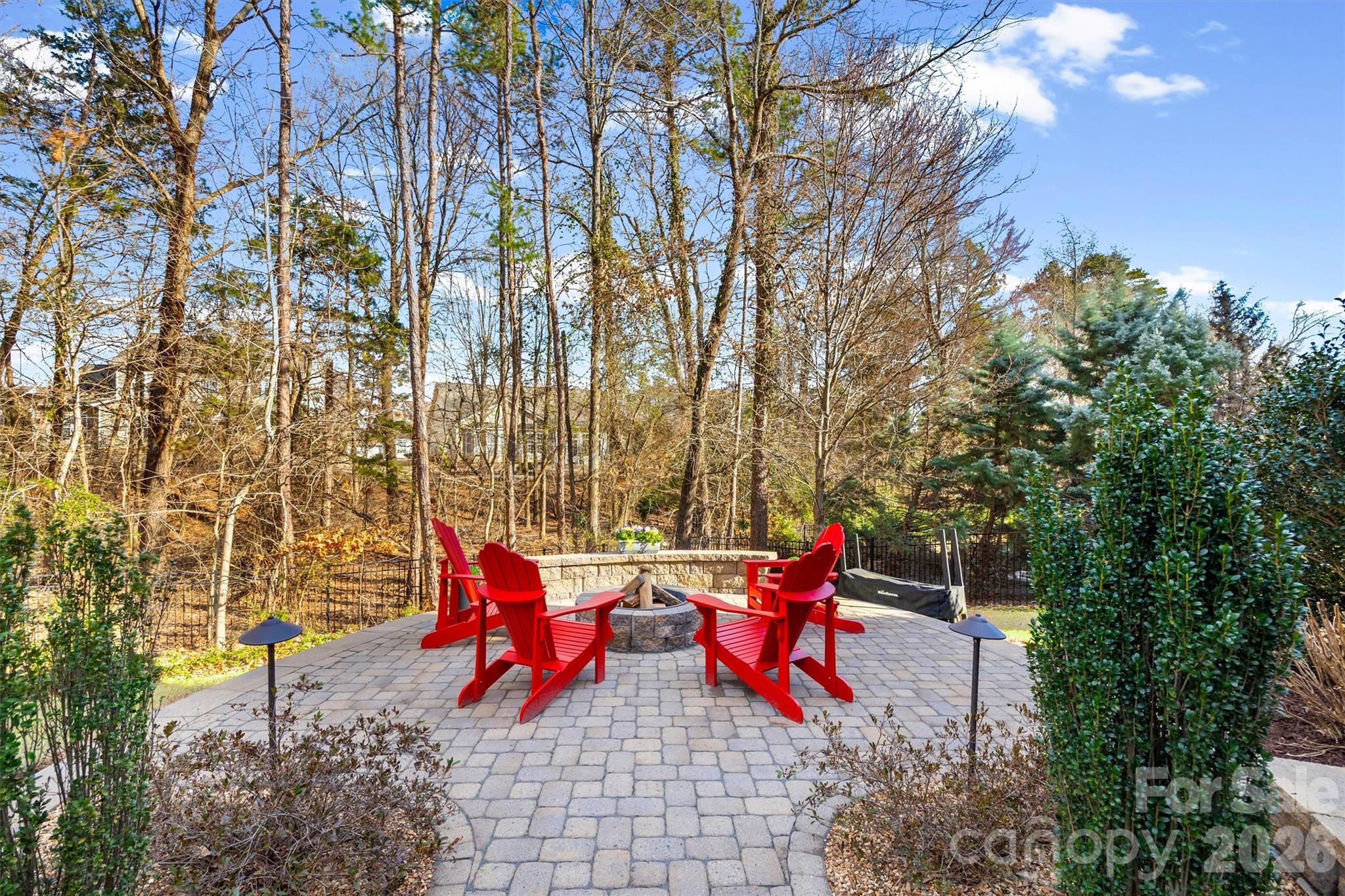 954 Castlewatch Drive Fort Mill, SC 29708 - Photo 39 of 45 a bench is sitting in the middle of a backyard