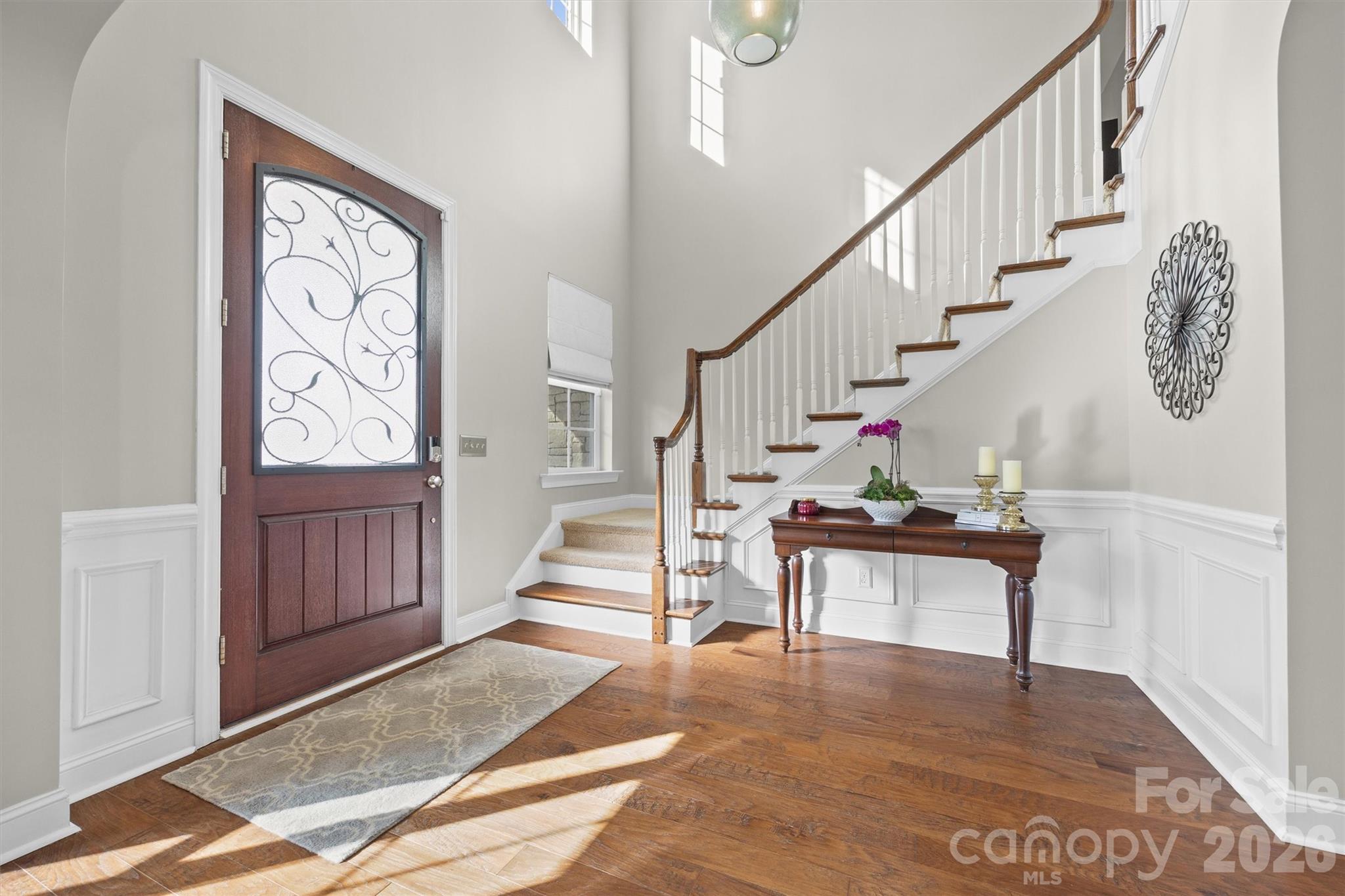 954 Castlewatch Drive Fort Mill, SC 29708 - Photo 4 of 45 a view of entryway livingroom and hall with wooden floor