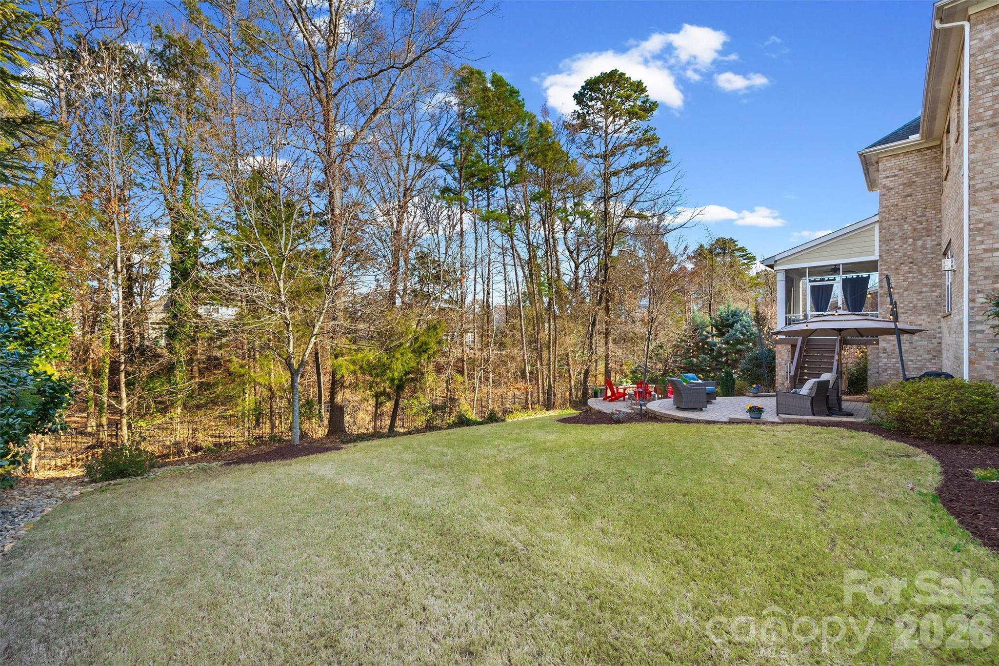 954 Castlewatch Drive Fort Mill, SC 29708 - Photo 41 of 45 a view of a house with a big yard and large trees