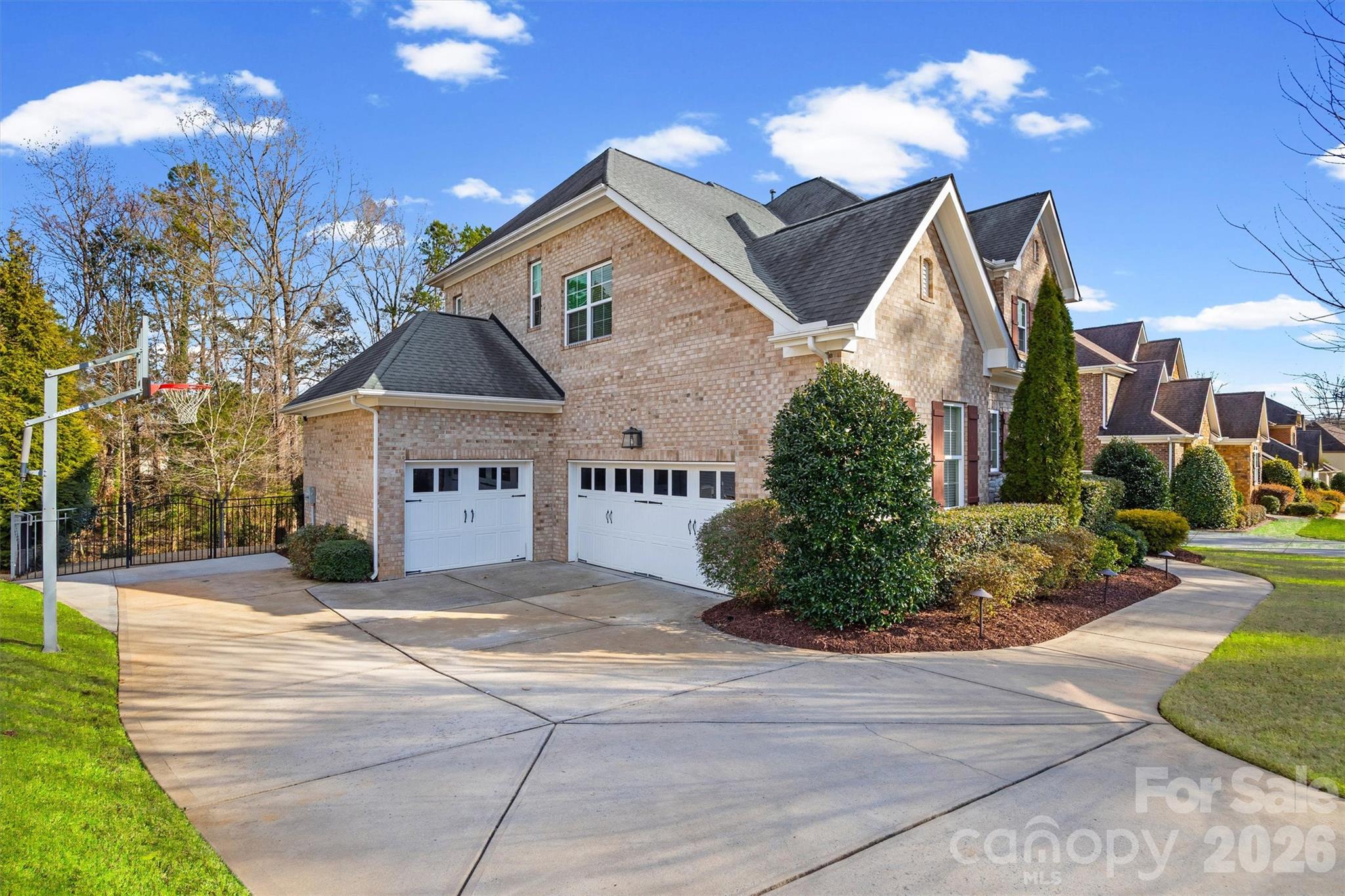 954 Castlewatch Drive Fort Mill, SC 29708 - Photo 42 of 45 a view of a house with a yard and potted plants