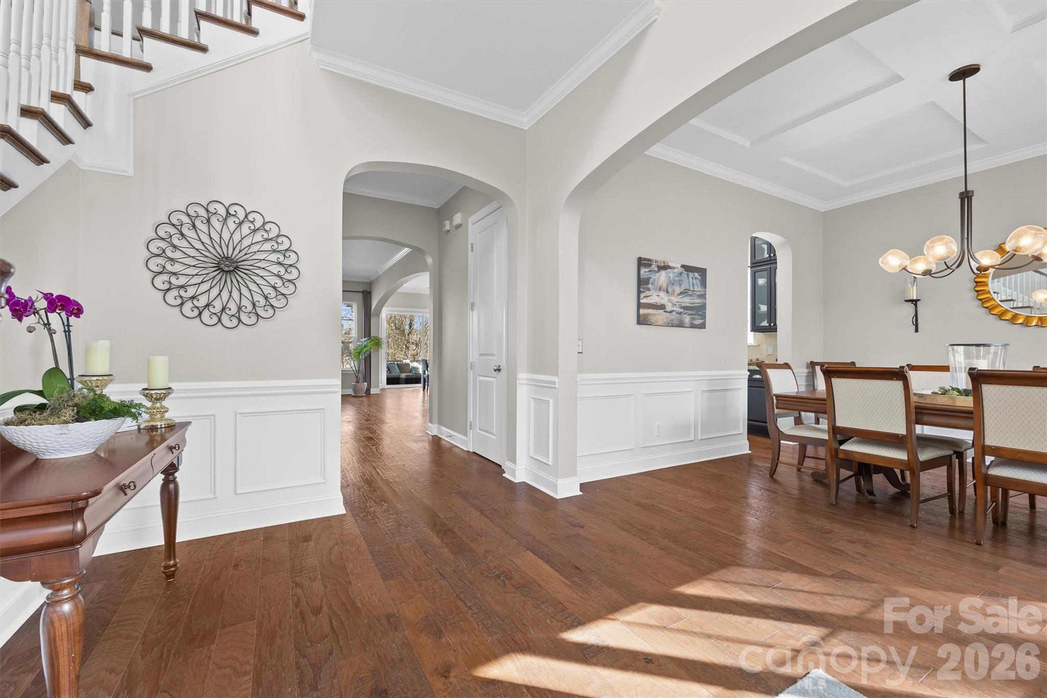 954 Castlewatch Drive Fort Mill, SC 29708 - Photo 5 of 45 a view of a dining room with furniture and wooden floor