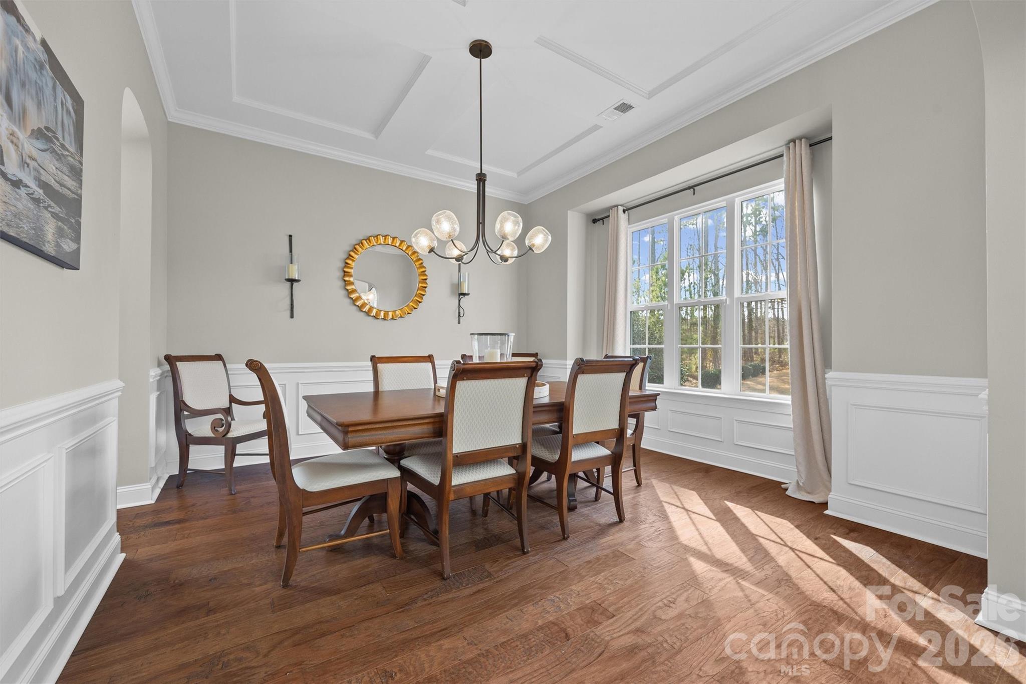 954 Castlewatch Drive Fort Mill, SC 29708 - Photo 6 of 45 a view of a dining room with furniture window and wooden floor