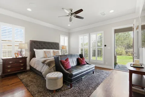 a living room with furniture and a large window with outer view