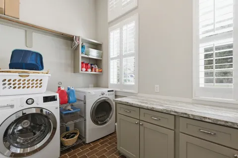 a utility room with dryer and washer