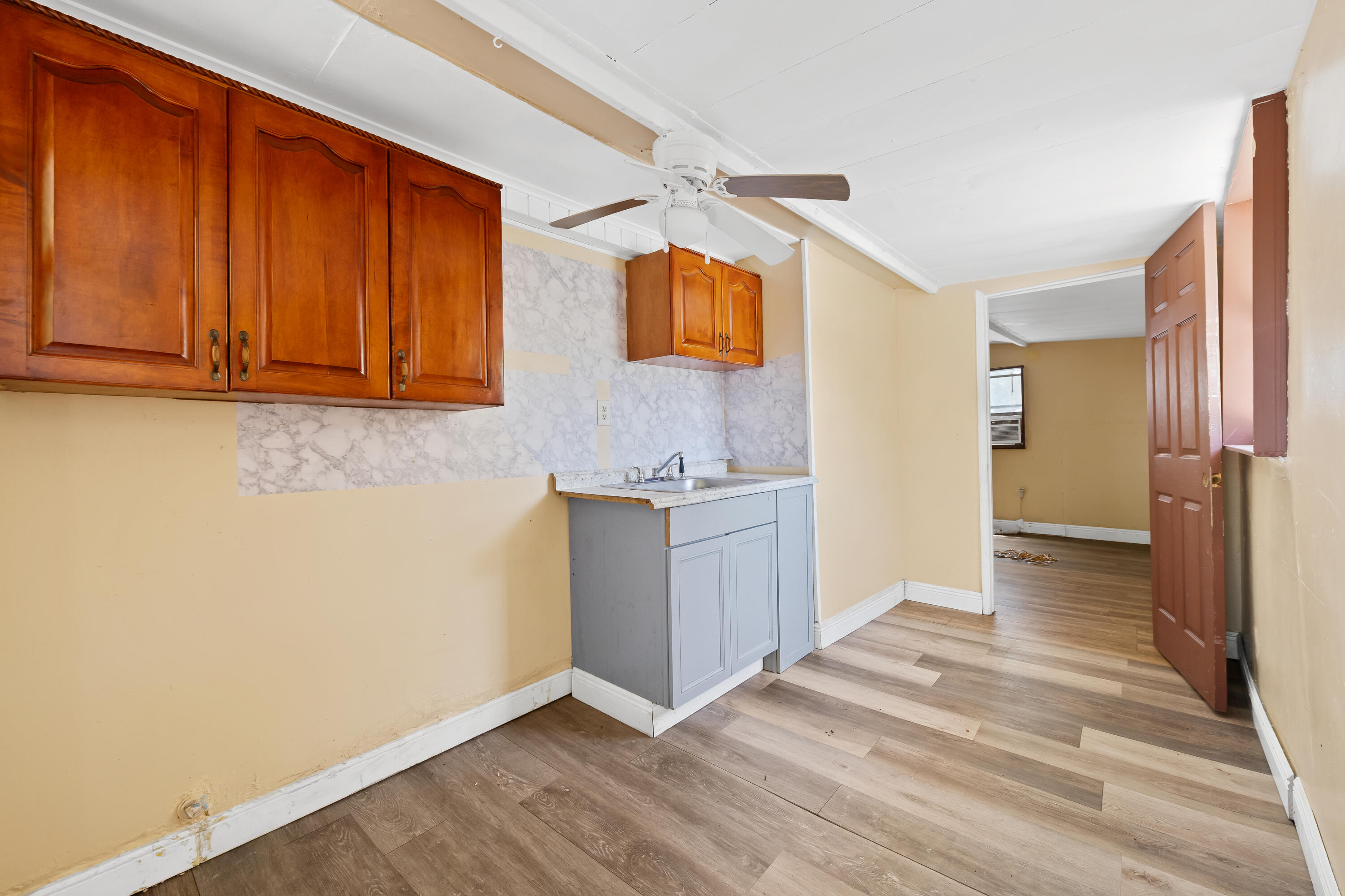 101 Northwest 18th Street Pompano Beach, FL 33060 - Photo 19 of 23 a view of a bathroom from the hallway
