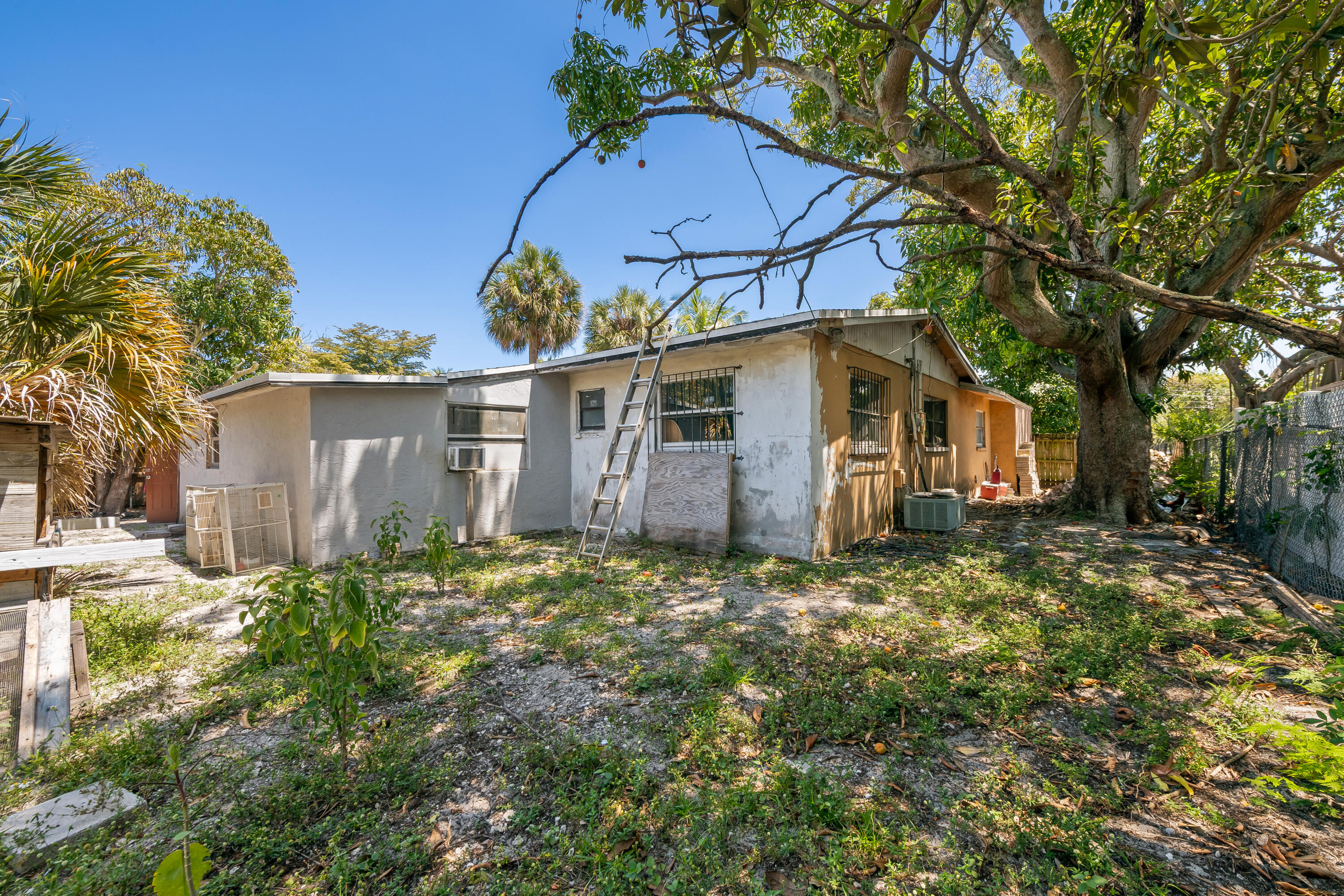 101 Northwest 18th Street Pompano Beach, FL 33060 - Photo 22 of 23 a view of a house with a yard