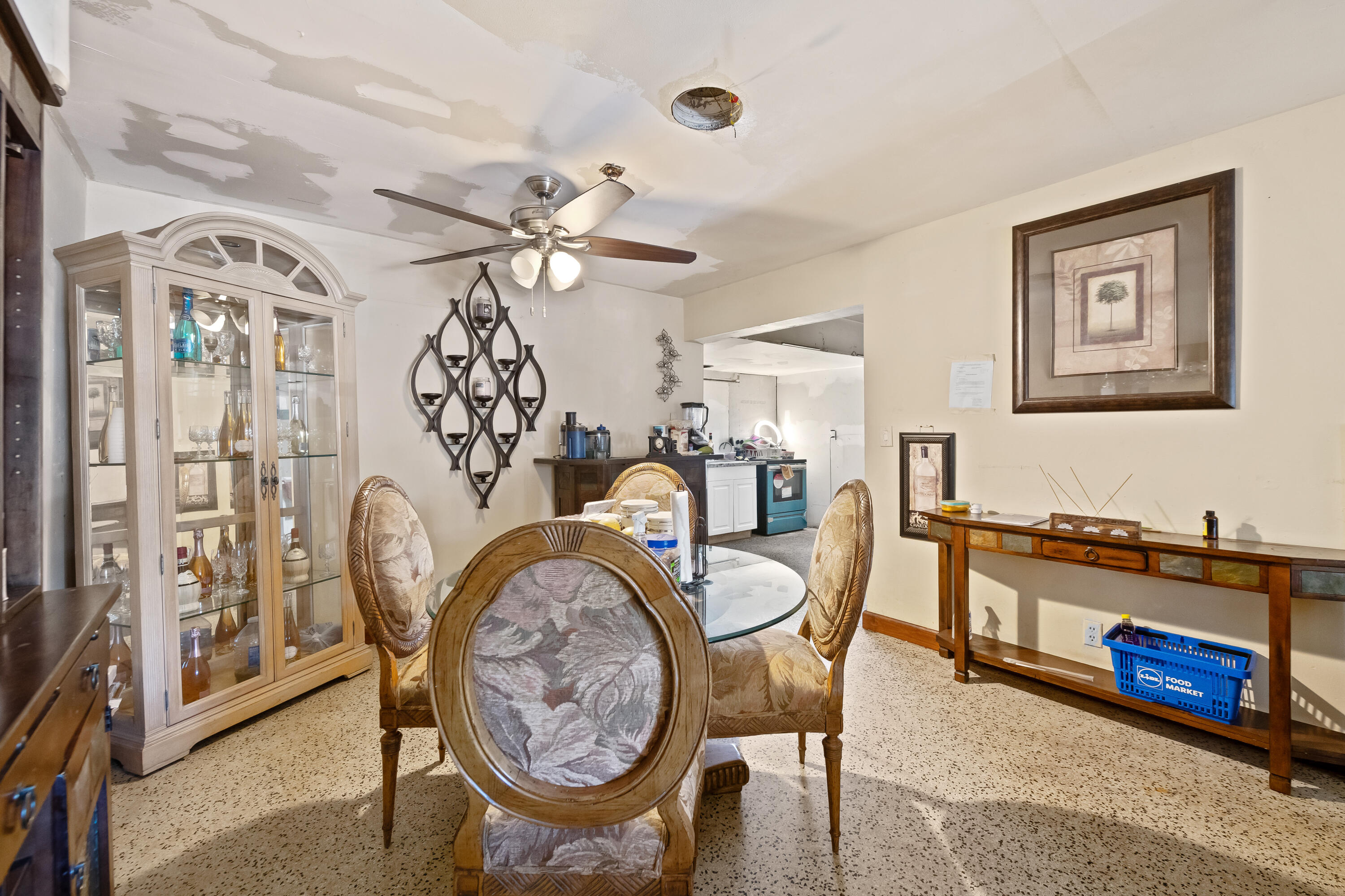 101 Northwest 18th Street Pompano Beach, FL 33060 - Photo 5 of 23 a living room with furniture a chandelier and a large window