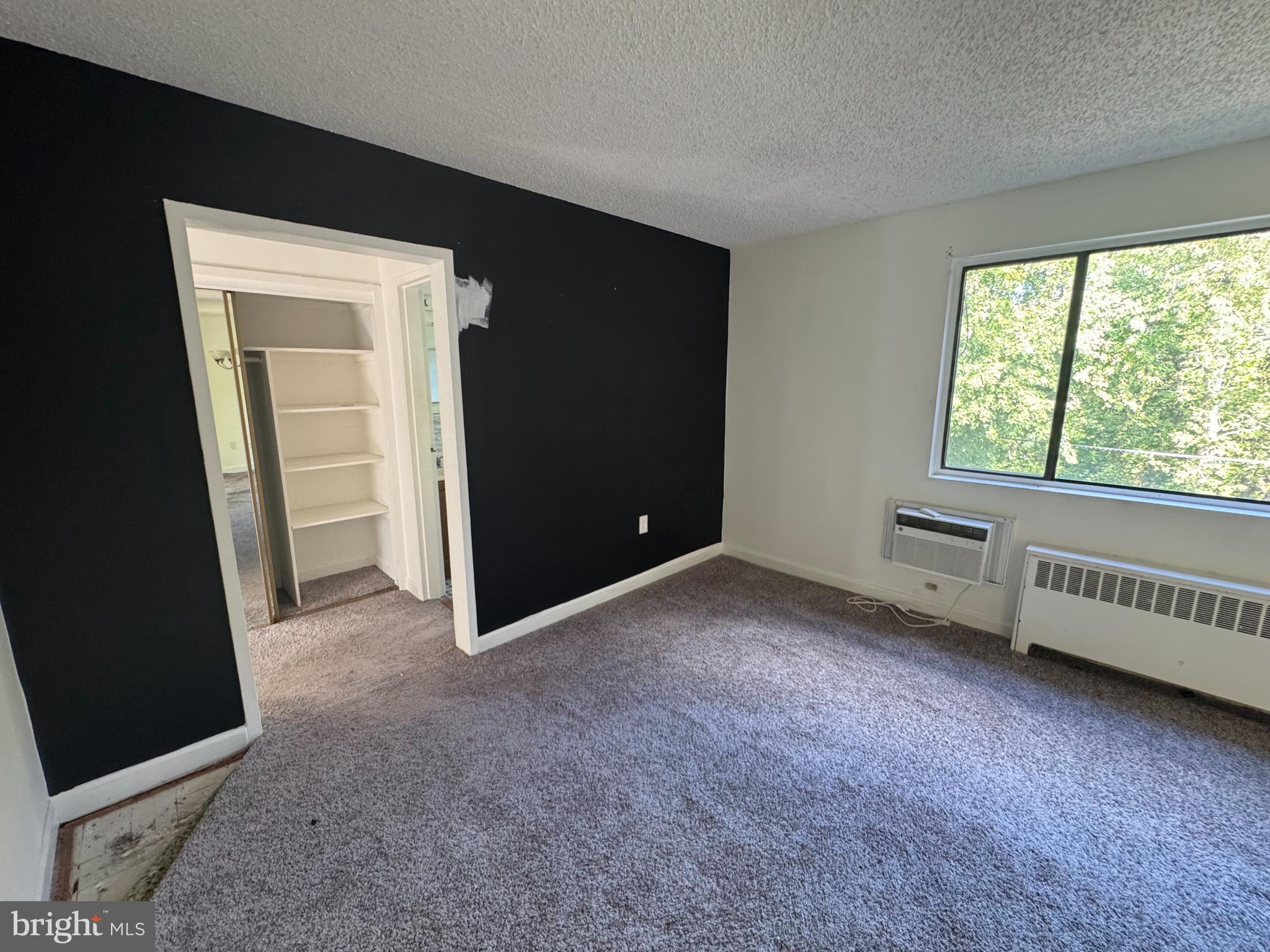 4725 1st Street Southwest, Unit 303 Washington, DC 20032 - Photo 15 of 17 a view of an empty room with a window