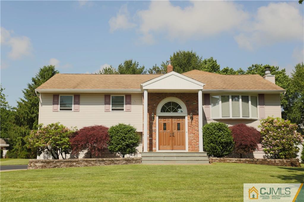 18 Homestead Road Freehold, NJ 07728 - Photo 1 of 32 a front view of a house with a yard