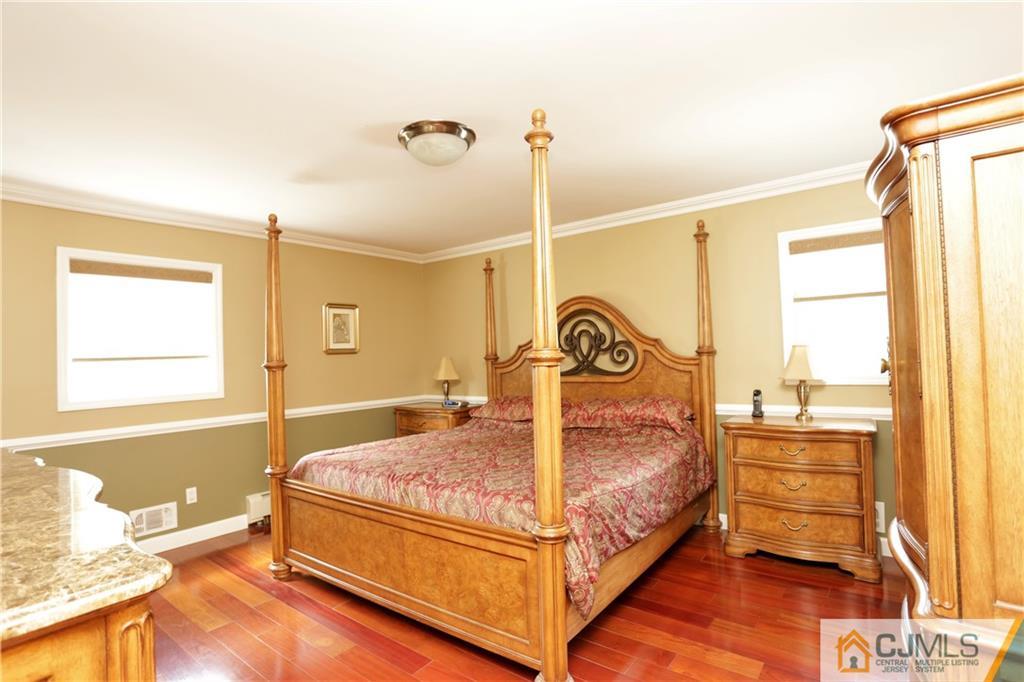 18 Homestead Road Freehold, NJ 07728 - Photo 24 of 32 a bedroom with a bed and a window
