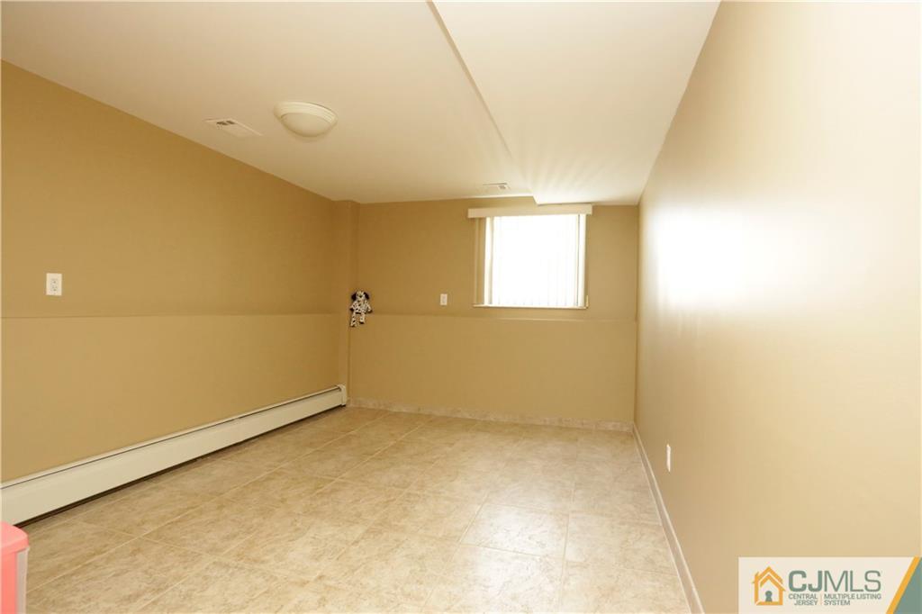 18 Homestead Road Freehold, NJ 07728 - Photo 7 of 32 a view of an empty room