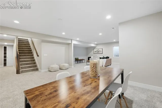 a view of a living room and dining room