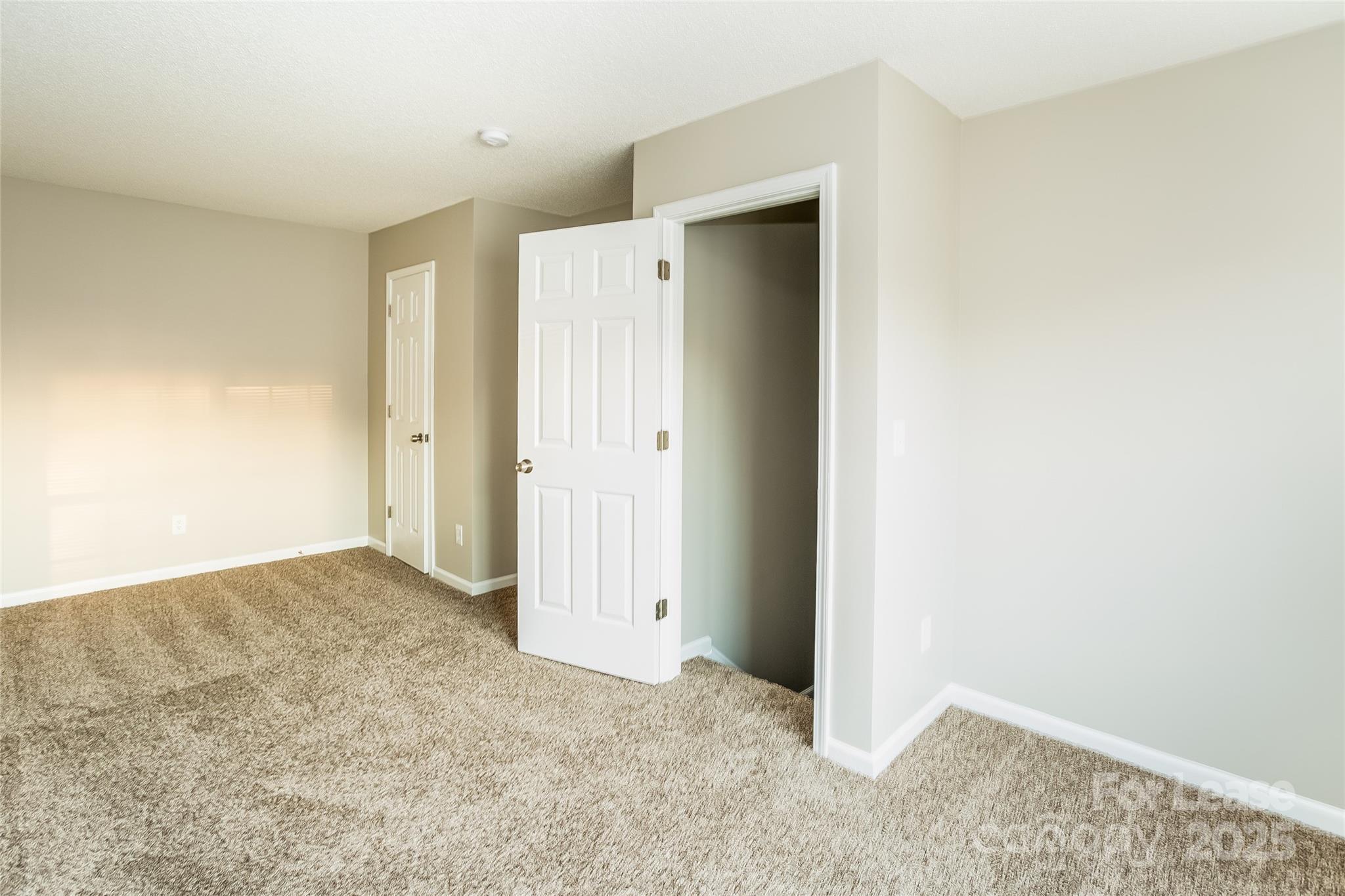 6131 Sid Crane Drive Charlotte, NC 28216 - Photo 14 of 17 a view of an empty room