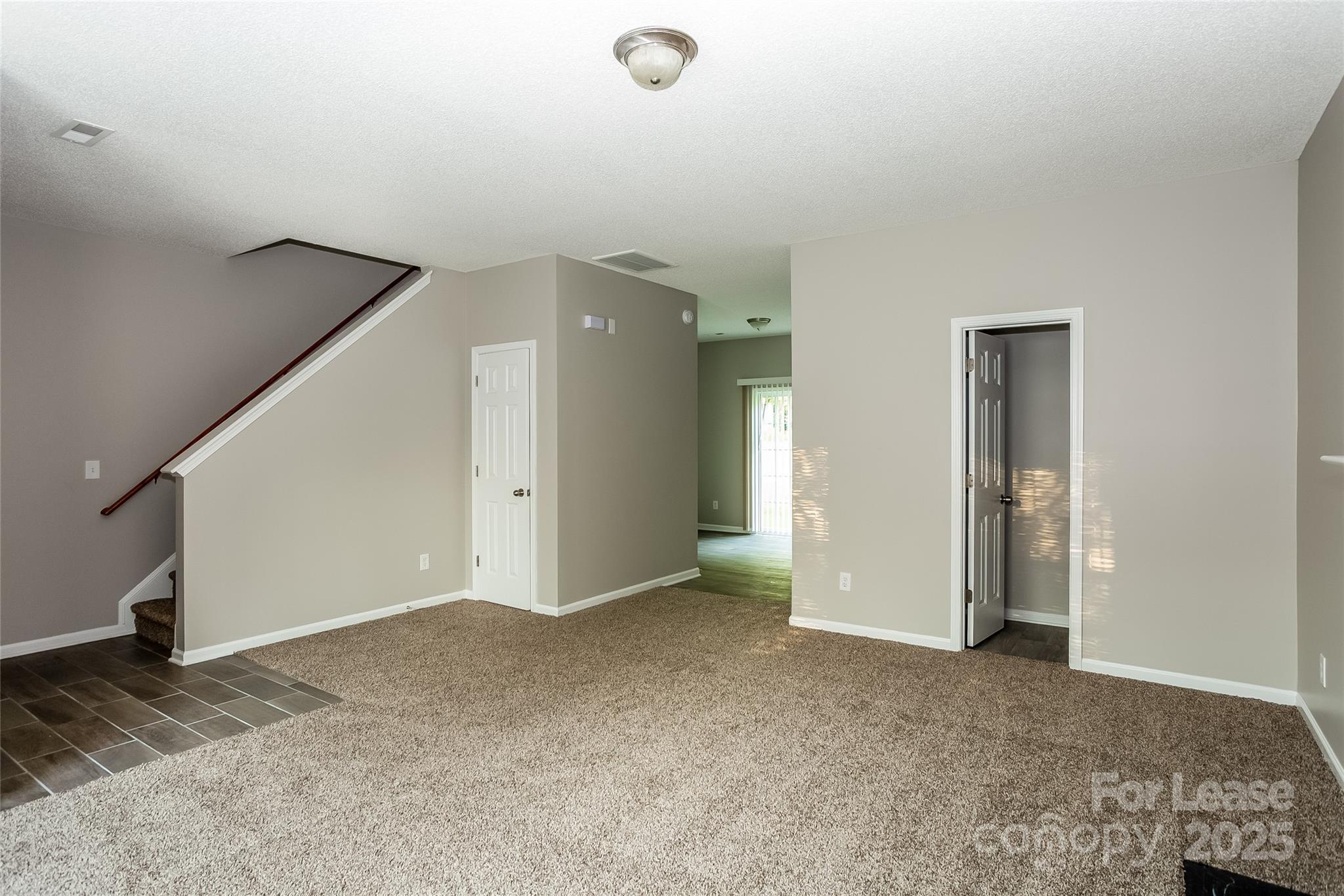 6131 Sid Crane Drive Charlotte, NC 28216 - Photo 4 of 17 a view of an empty room