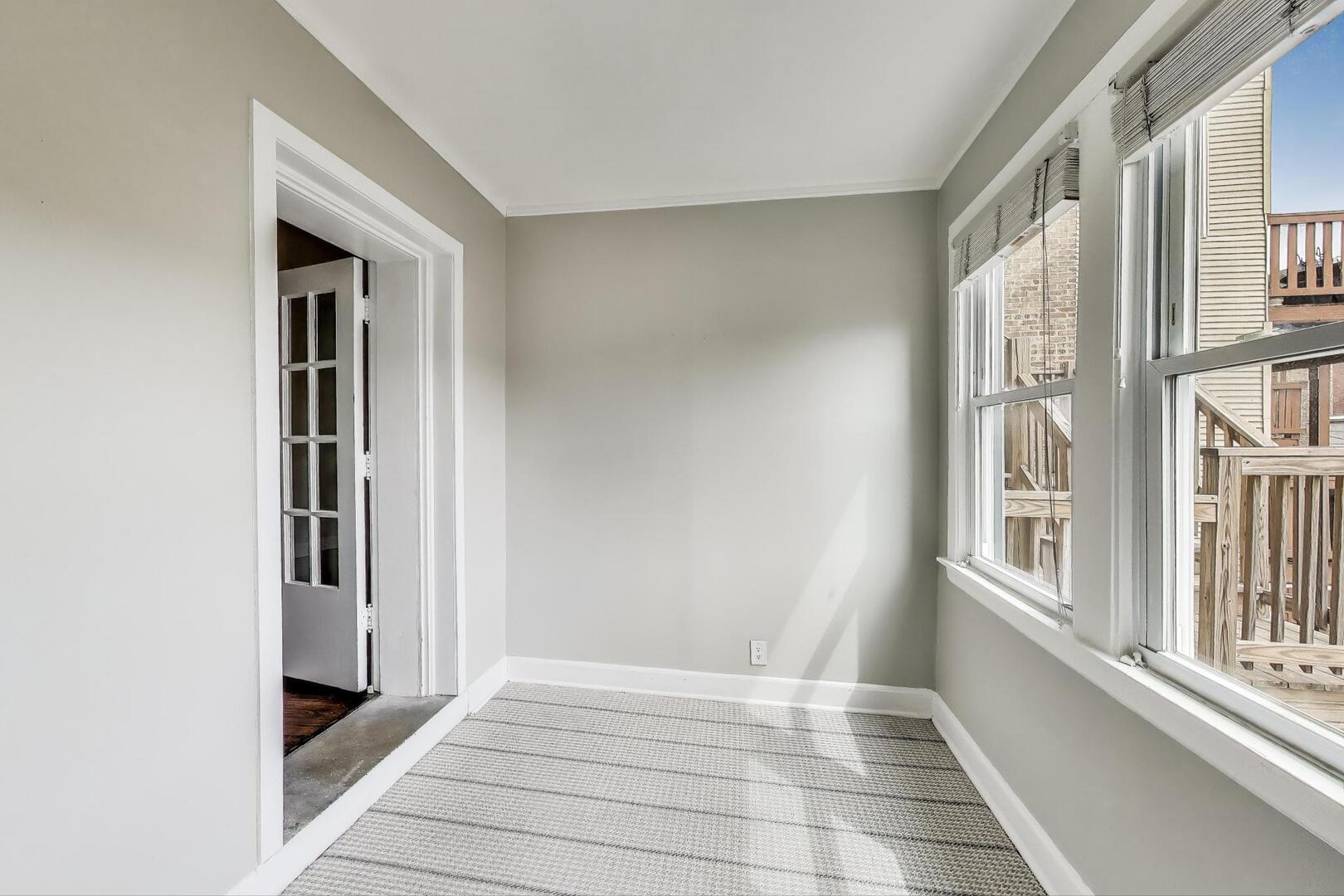 1451 West Warner Avenue, Unit 2 Chicago, IL 60613 - Photo 19 of 23 a view of an entryway with a kitchen