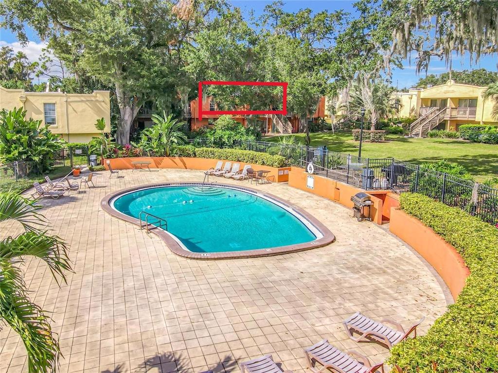 772 East Michigan Street, Unit 70 Orlando, FL 32806 - Photo 3 of 54 a view of outdoor space yard and swimming pool