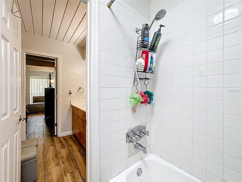 772 East Michigan Street, Unit 70 Orlando, FL 32806 - Photo 32 of 54 a view of a hallway and a dining room view