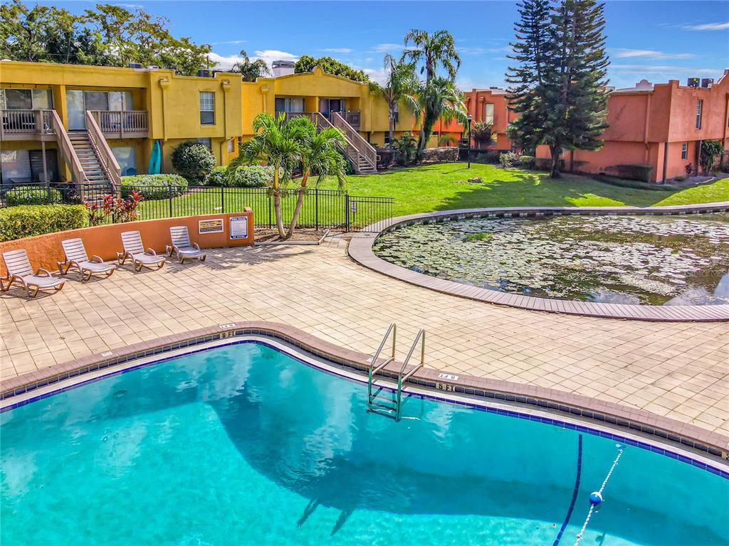 772 East Michigan Street, Unit 70 Orlando, FL 32806 - Photo 47 of 54 a view of a house with a swimming pool