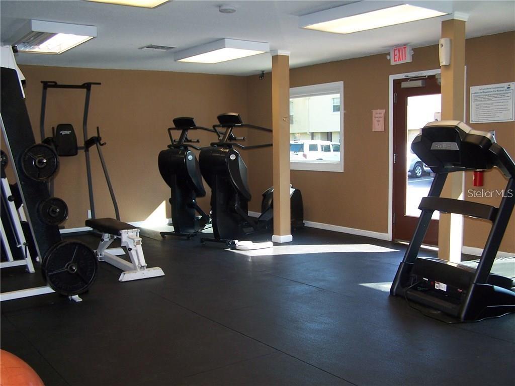 772 East Michigan Street, Unit 70 Orlando, FL 32806 - Photo 50 of 54 a view of a room with gym equipment