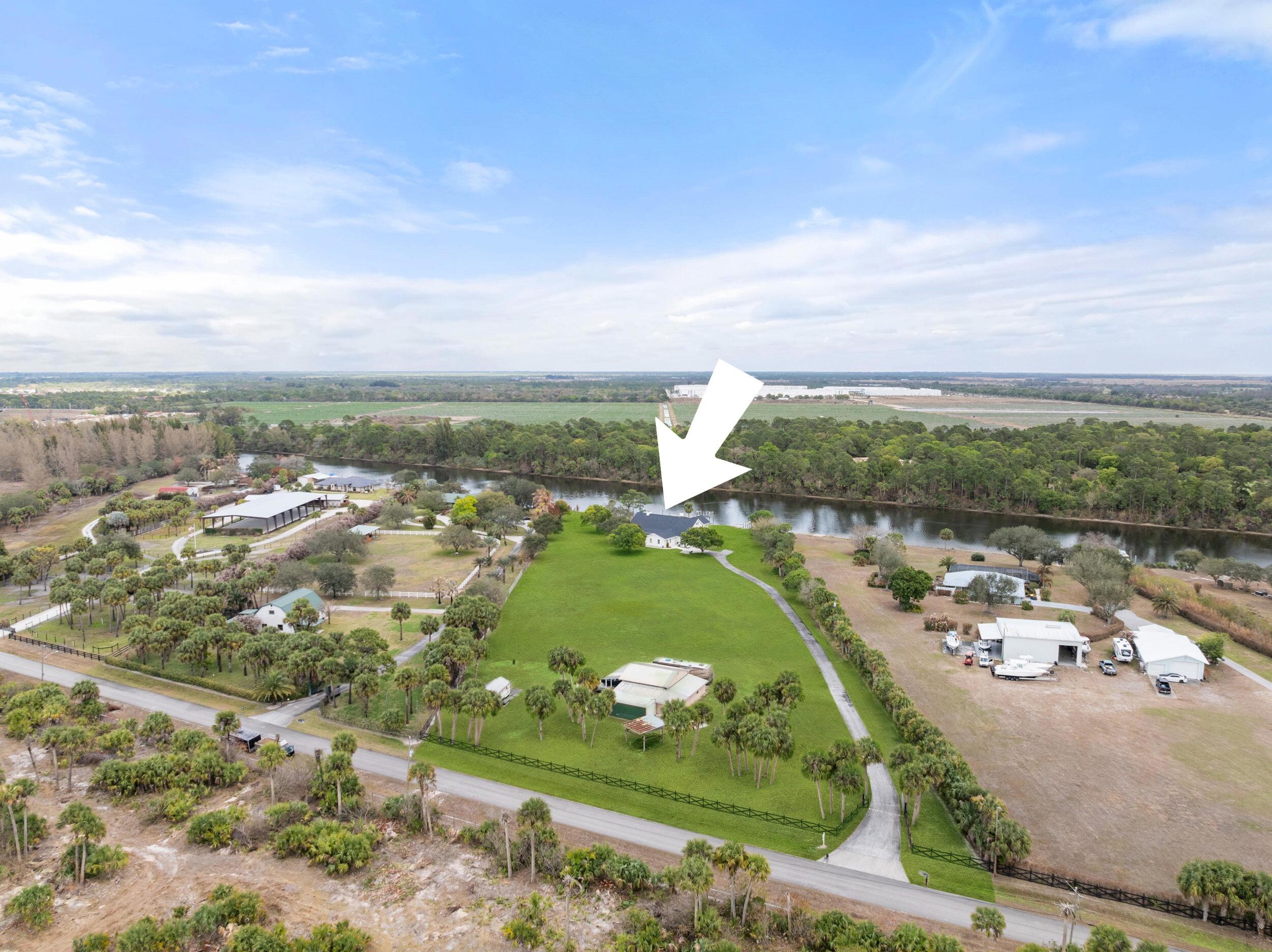 10125 Southwest Green Ridge Lane, Unit LANE Palm City, FL 34990 - Photo 61 of 84 61_dji_20260227035820_0119_d.1