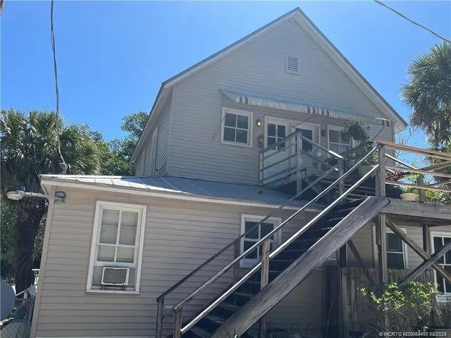 a front view of a house with balcony