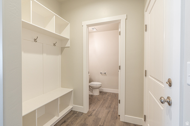 2249 South 1090 West, Unit 76 Nibley, UT 84321 - Photo 6 of 19 Built-in white storage bench with upper shelving and coat hooks