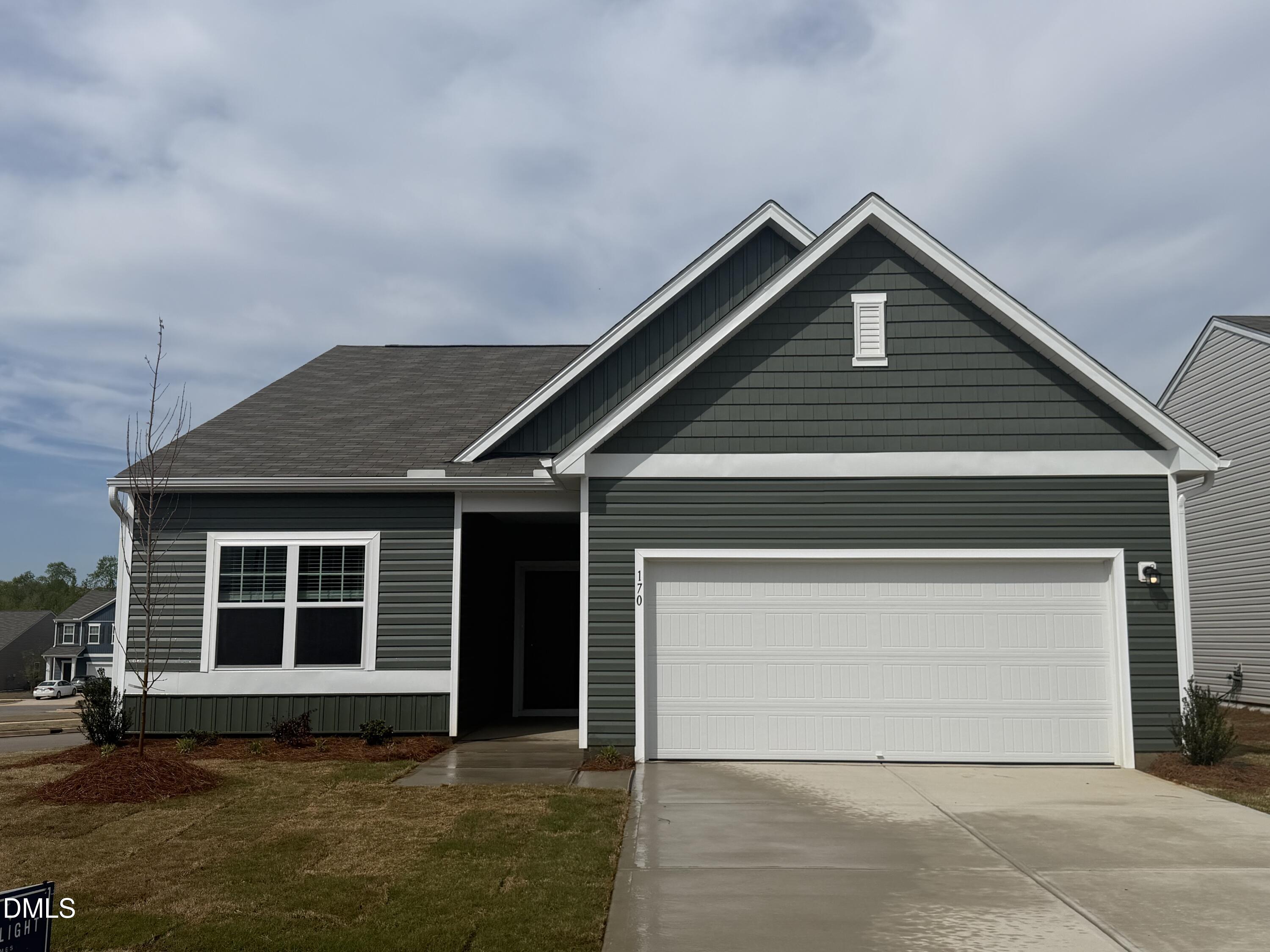 170 Bedstone Way Clayton, NC 27520 - Photo 1 of 22 a front view of a house with a yard